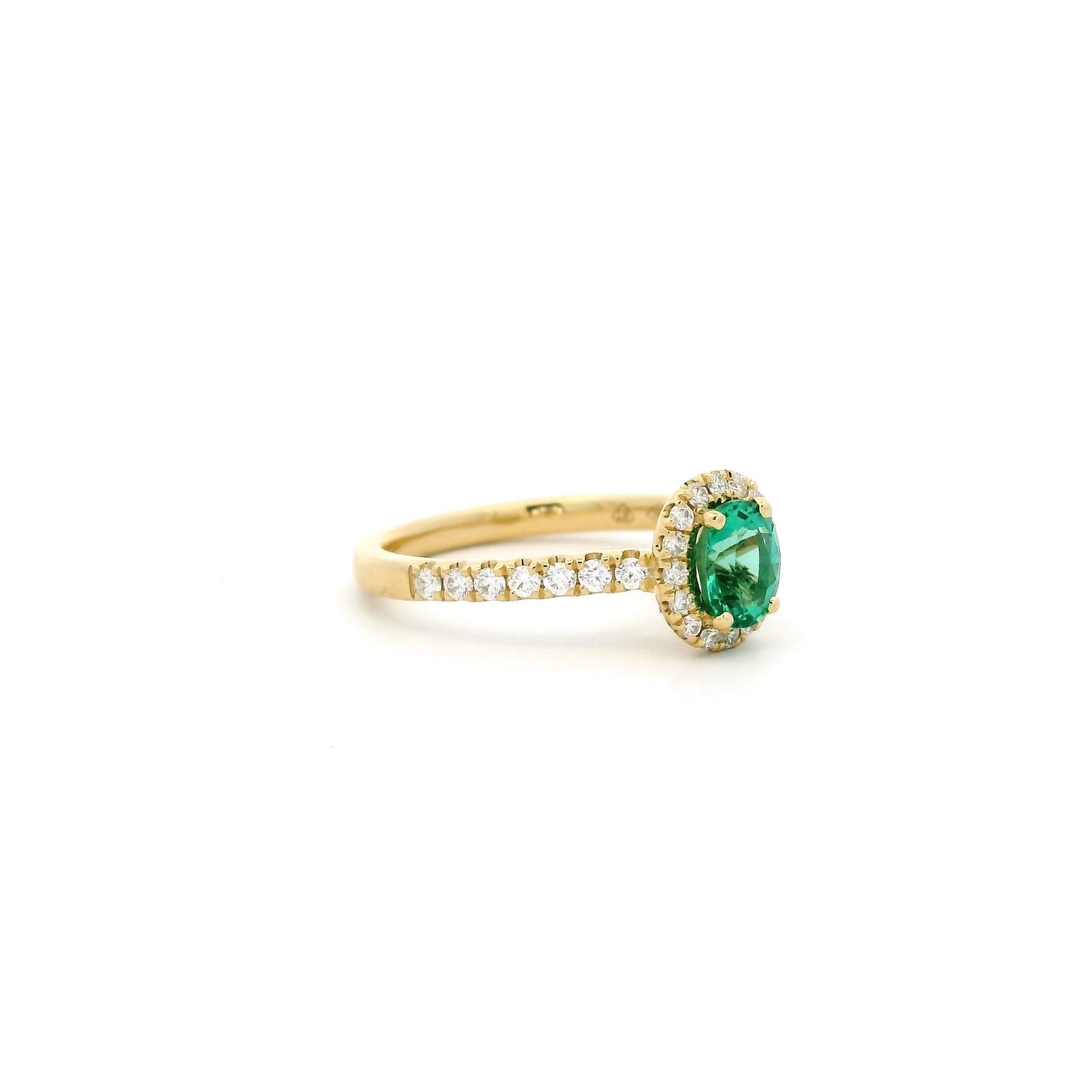 0.64ct Oval Emerald And Round Diamond Cluster Ring