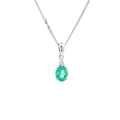 0.61ct Oval Emerald And Round Diamond Pendant