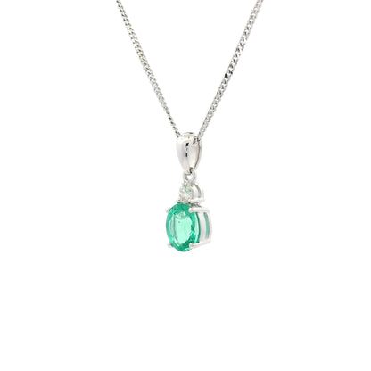0.61ct Oval Emerald And Round Diamond Pendant