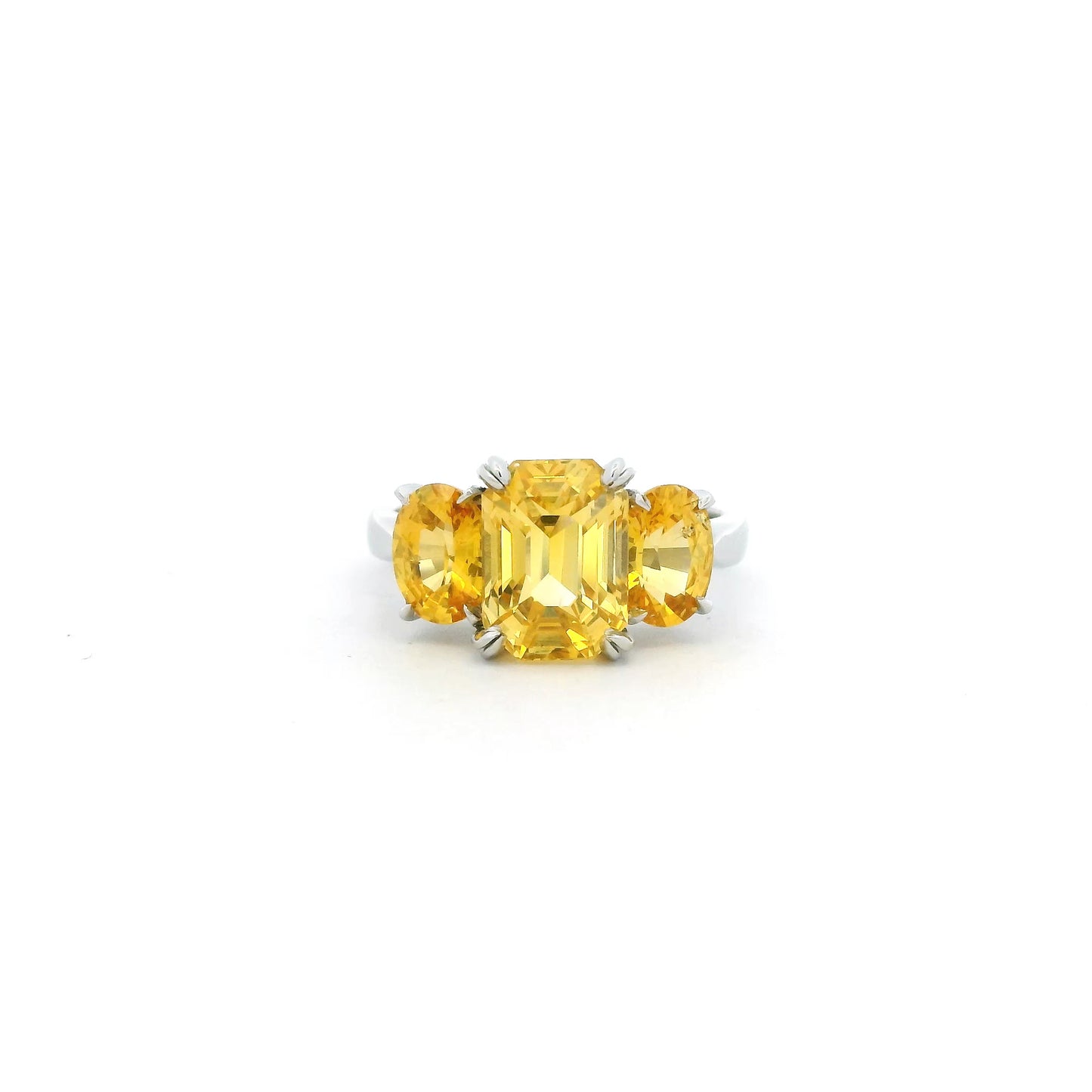 6.19ct Emerald And Oval Cut Yellow Sapphire Three Stone Ring