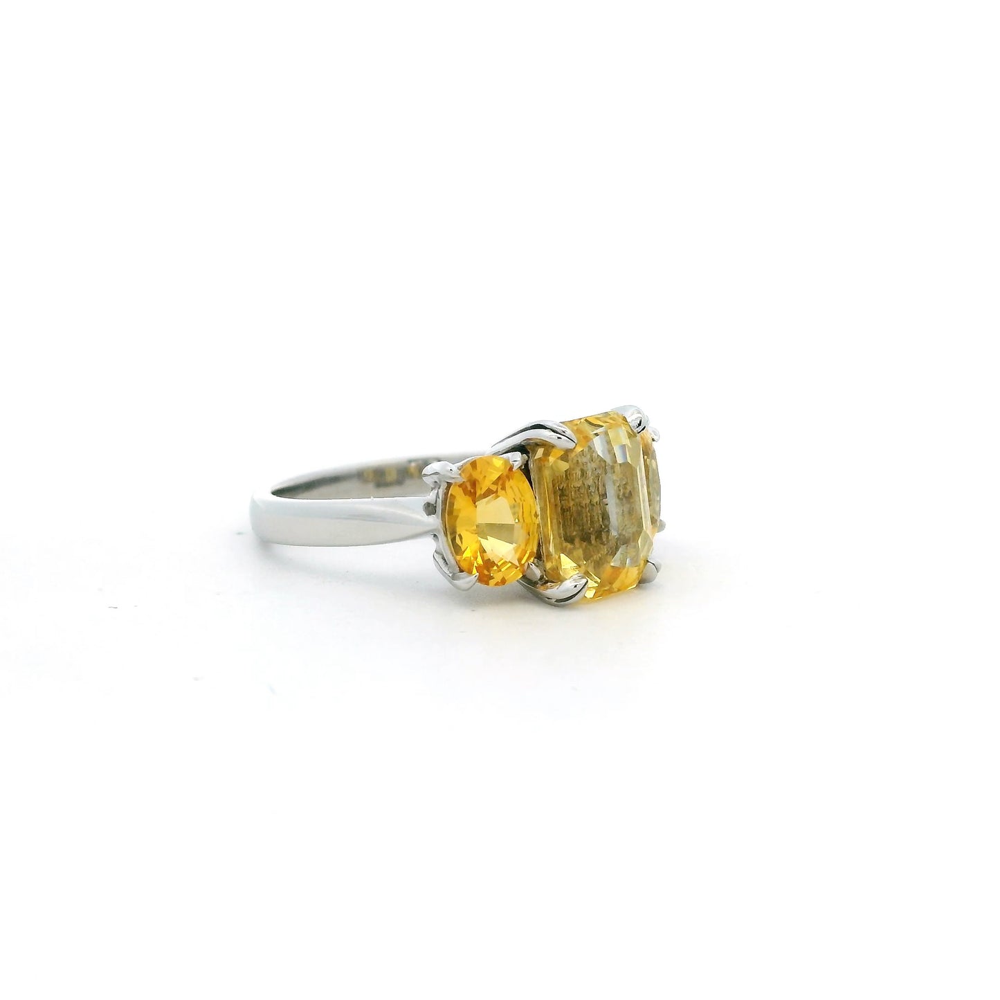 6.19ct Emerald And Oval Cut Yellow Sapphire Three Stone Ring