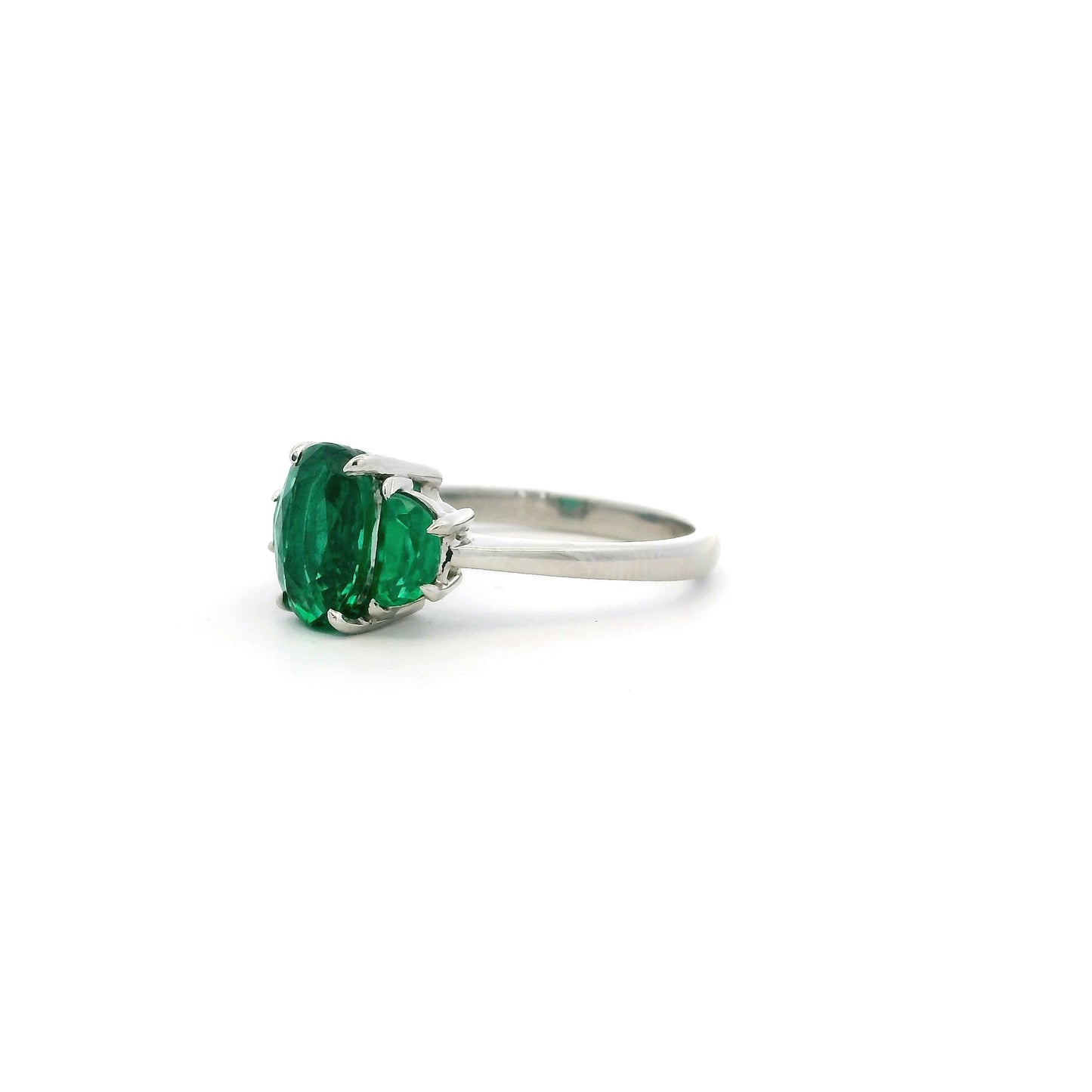 2.24ct Oval And Half Moon Cut Emerald Three Stone Ring