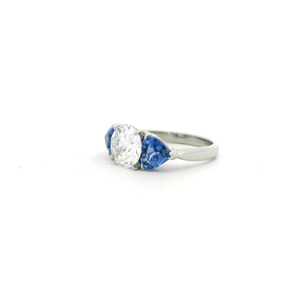 1.88ct Transitional Cut Diamond And Heart Cut Sapphire Three Stone Ring