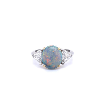 1.93ct Cabochon Oval Opal And Trilliant Cut Diamond Three Stone Ring