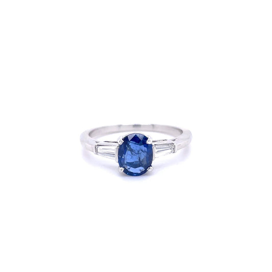1.49ct Oval Sapphire And Tapered Baguette Diamond Three Stone Ring