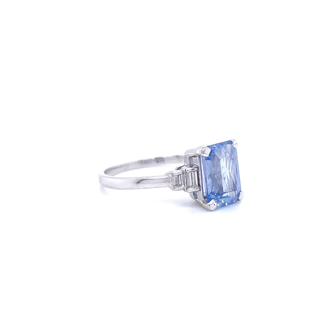 1.23ct Emerald cut Sapphire and Diamond Five Stone ring