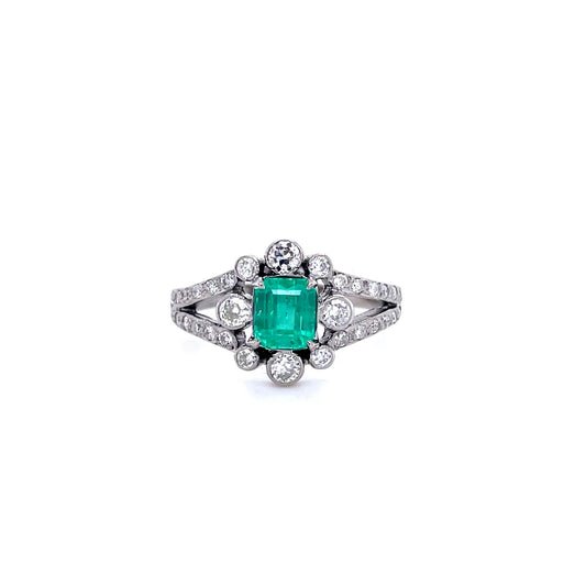 0.85ct Emerald Cut Emerald And Diamond Cluster Ring