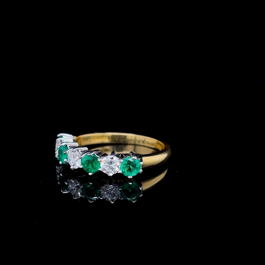 0.66ct Round Emerald And Diamond Seven Stone Ring