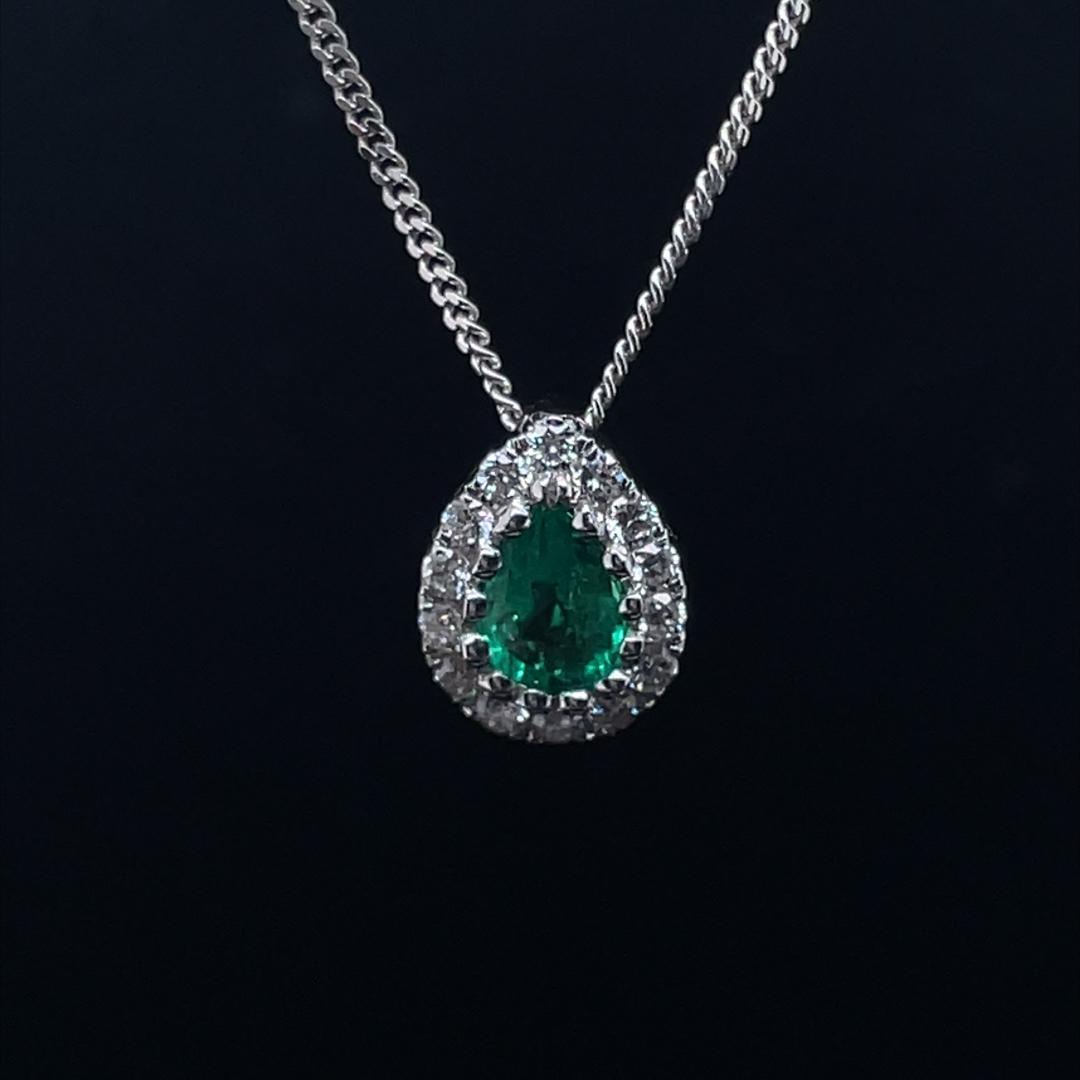 0.27ct Pear Cut Emerald And Diamond Cluster Pendant