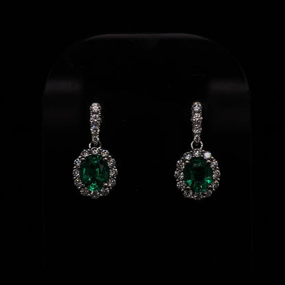 0.63ct Oval Emerald And Diamond Cluster Drop Earrings