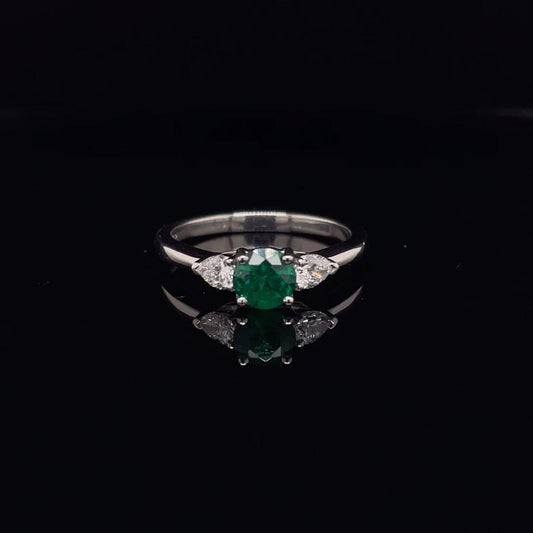 0.60ct Round Emerald And Pear Cut Diamond Three Stone Ring