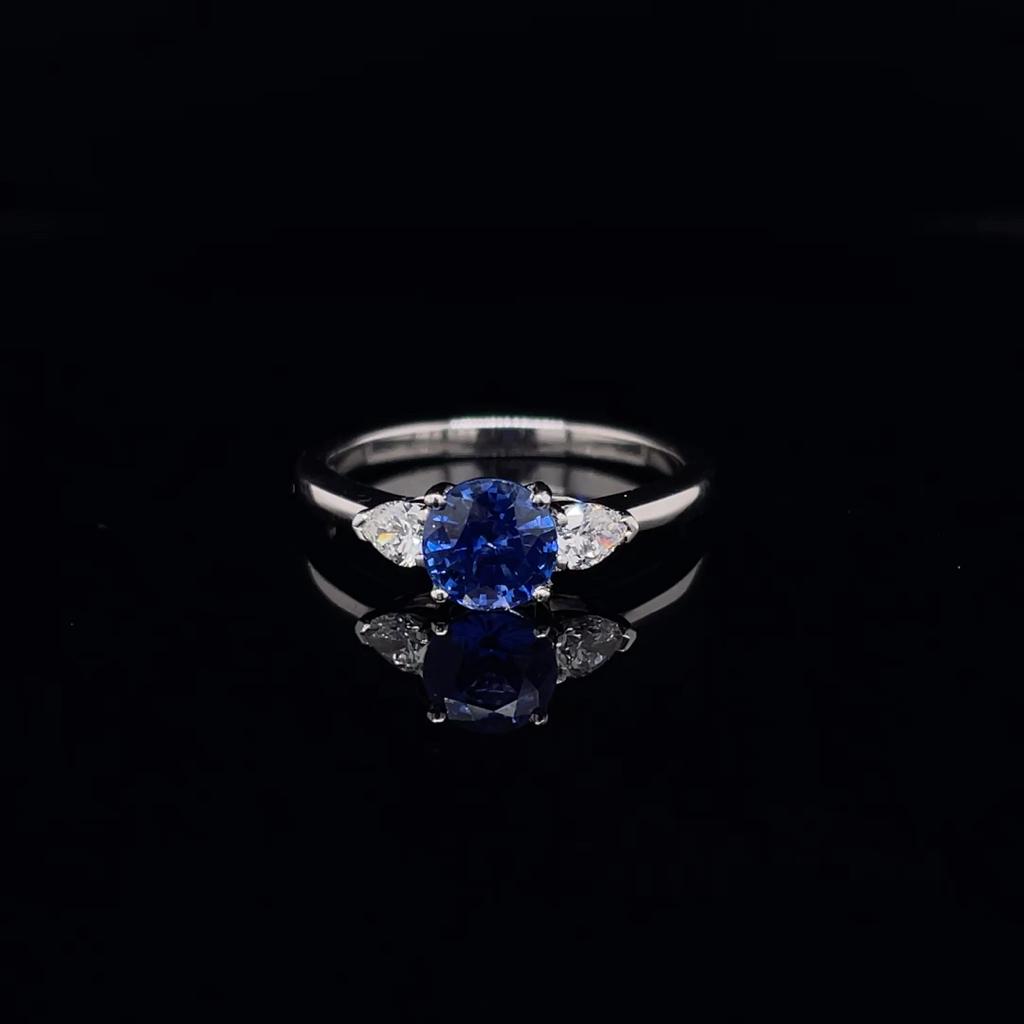 1.14ct Round Sapphire And Pear Cut Diamond Three Stone Ring