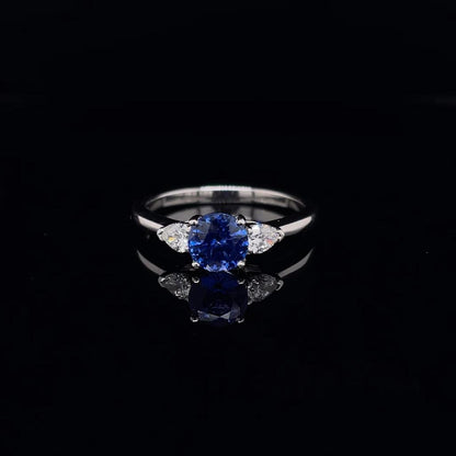 1.14ct Round Sapphire And Pear Cut Diamond Three Stone Ring