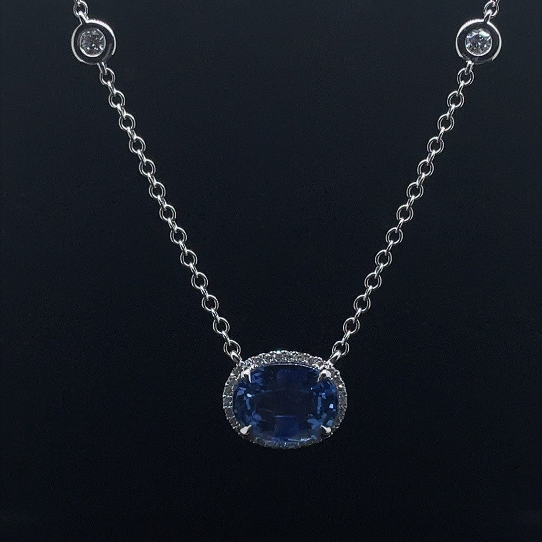 2.18ct Oval Sapphire And Diamond Cluster Pendant