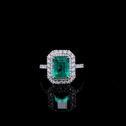 1.91ct Emerald Cut Emerald And Diamond Cluster Ring