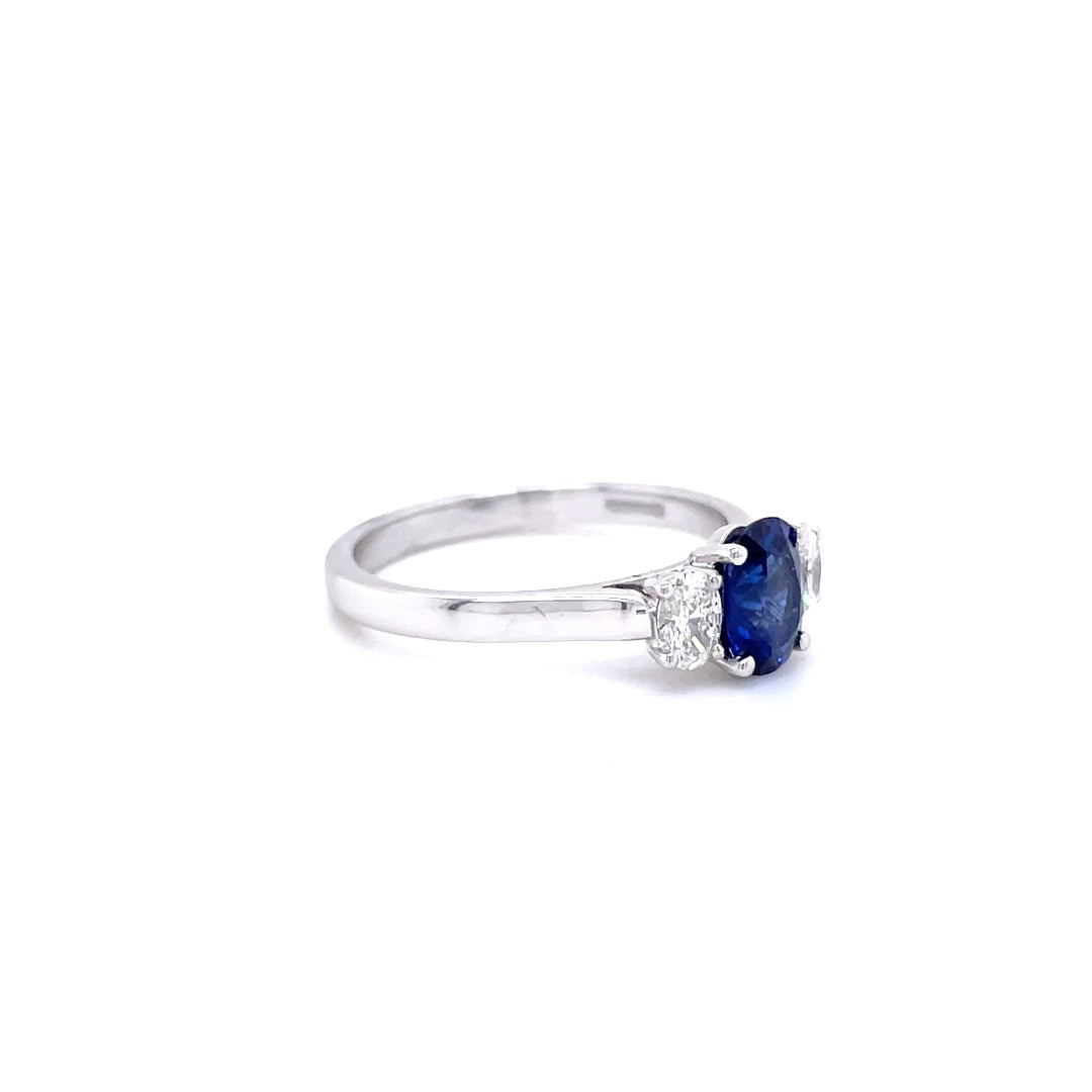 0.95ct Oval Sapphire And Oval Diamond Three Stone Ring