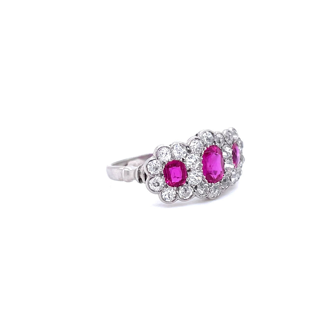 0.90ct Oval Ruby and Round Diamond Triple Cluster Dress Ring
