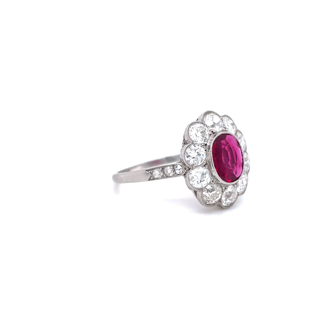 0.57ct Oval Ruby and Diamond Cluster Ring