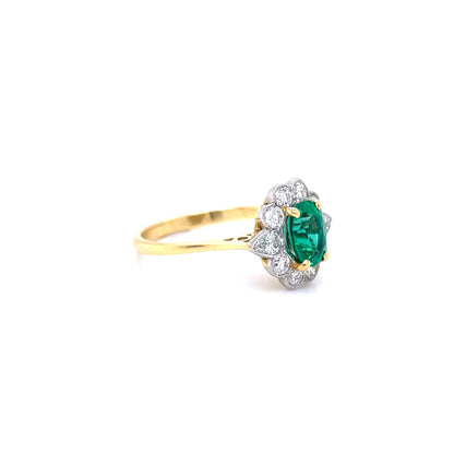 0.82ct Oval Emerald And Diamond Cluster Ring