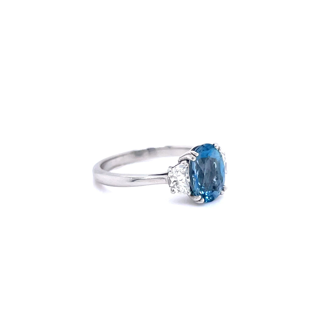 1.68ct Oval Aquamarine And Half Moon Diamond Three Stone Ring