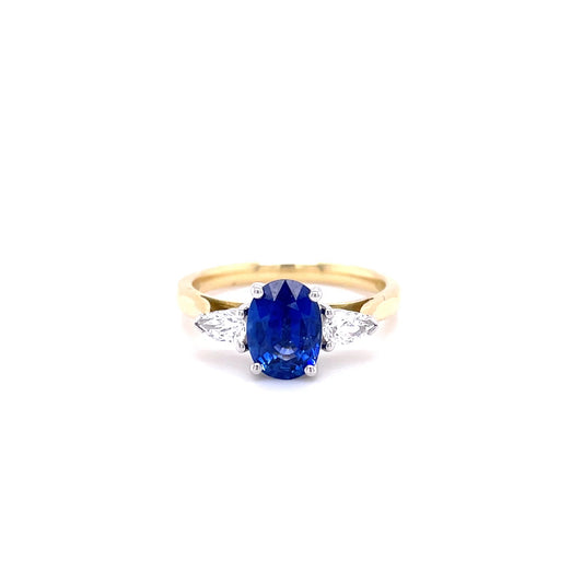 1.34ct Oval Sapphire And Pear Cut Diamond Three Stone Ring