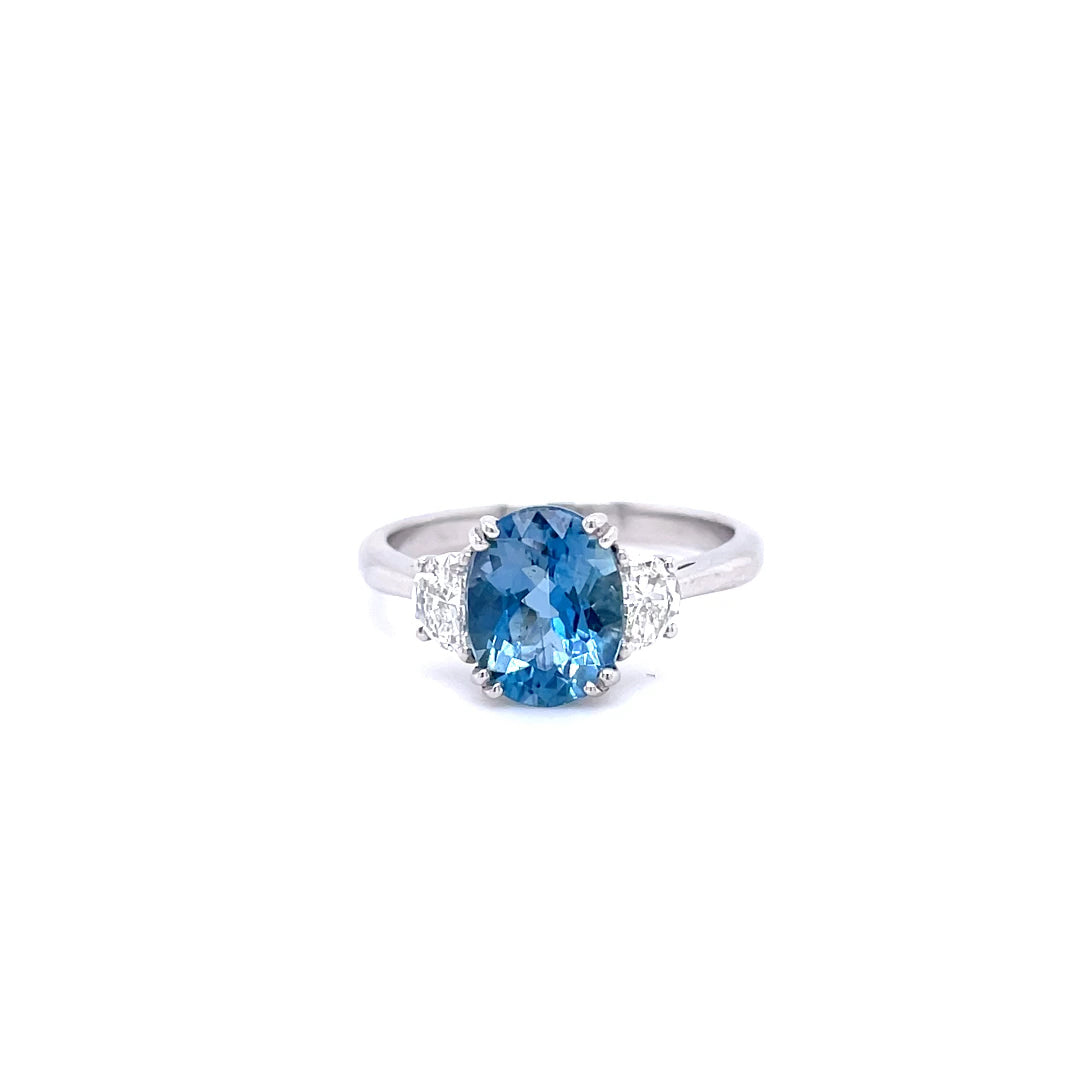 1.68ct Oval Aquamarine And Half Moon Diamond Three Stone Ring
