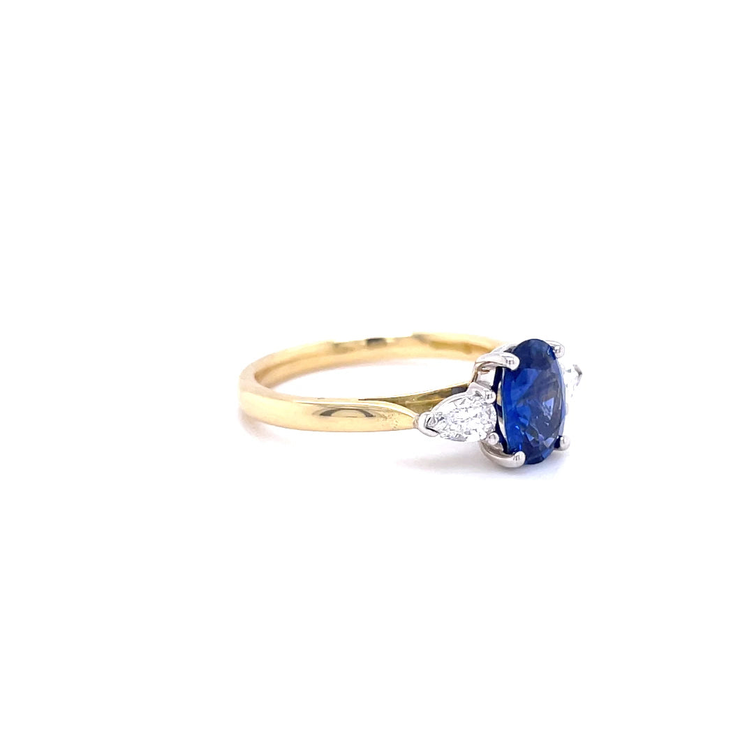 1.34ct Oval Sapphire And Pear Cut Diamond Three Stone Ring