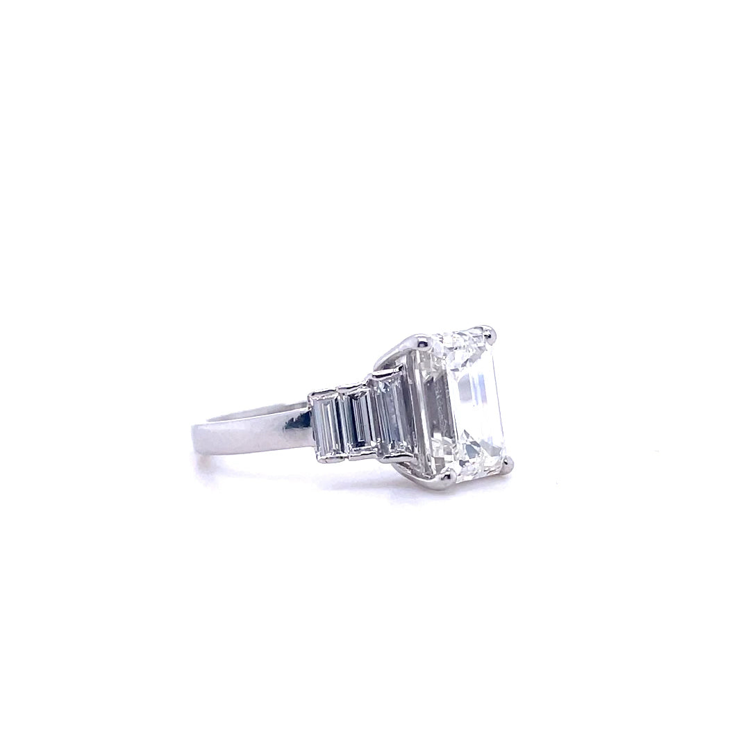 2.26ct Emerald Cut Diamond And 0.70ct Baguette Cut Diamond Seven Stone Ring