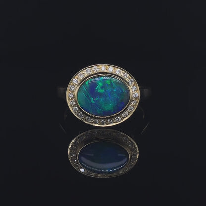 1.36ct Oval Opal And Diamond Cluster Ring