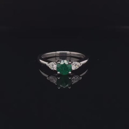 0.60ct Round Emerald And Pear Cut Diamond Three Stone Ring
