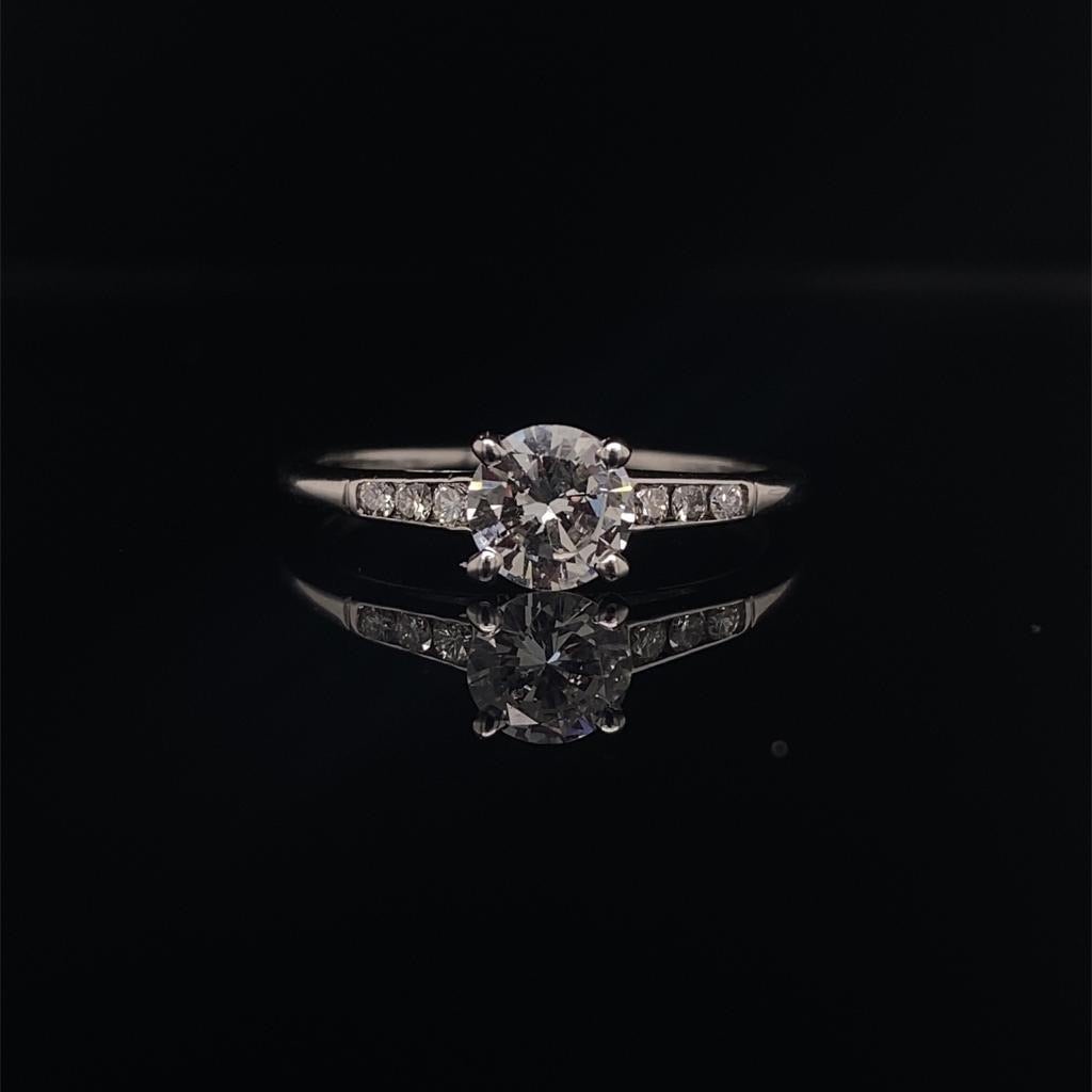 0.63ct Certified Round Brilliant Cut Diamond Ring with Diamond Set Shoulders