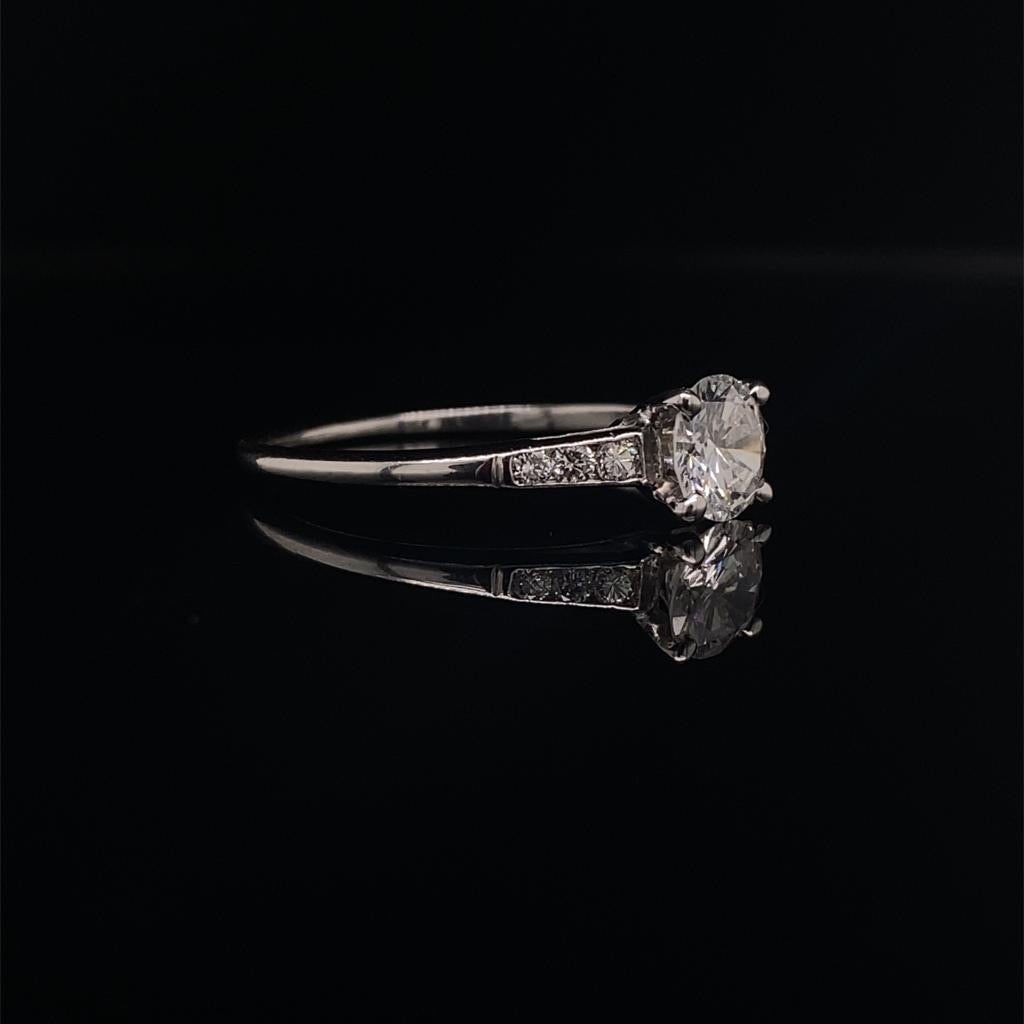 0.63ct Certified Round Brilliant Cut Diamond Ring with Diamond Set Shoulders