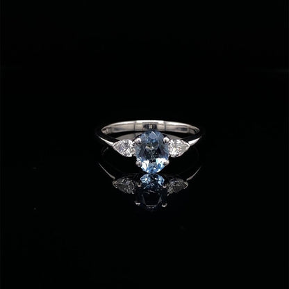 0.69ct Oval Cut Aquamarine and Diamond Three Stone Ring