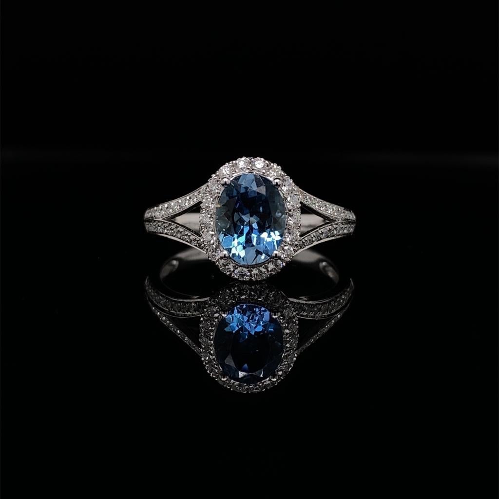 0.90ct Oval Cut Aquamarine and Diamond Cluster Dress Ring