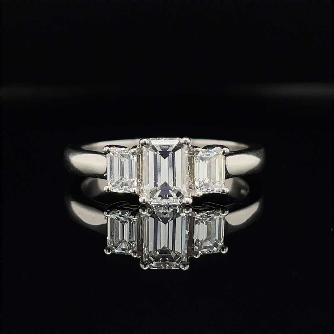 0.61ct Emerald Cut Diamond Three Stone Ring