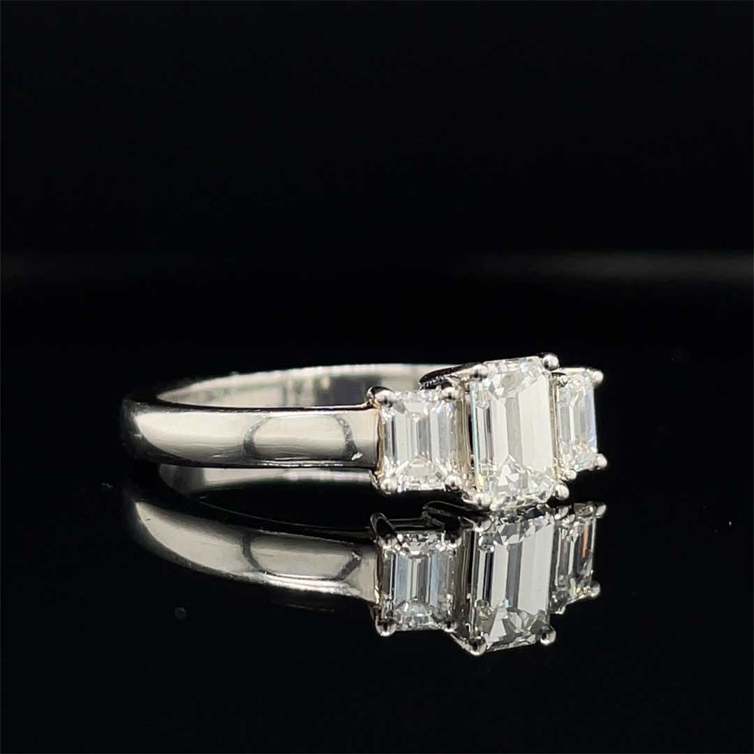 0.61ct Emerald Cut Diamond Three Stone Ring