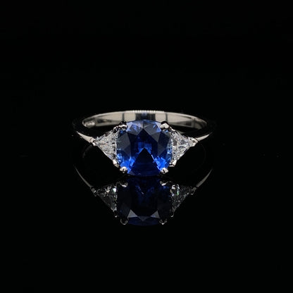 1.63ct Cushion Sapphire and Trilliant Diamond Three Stone Ring