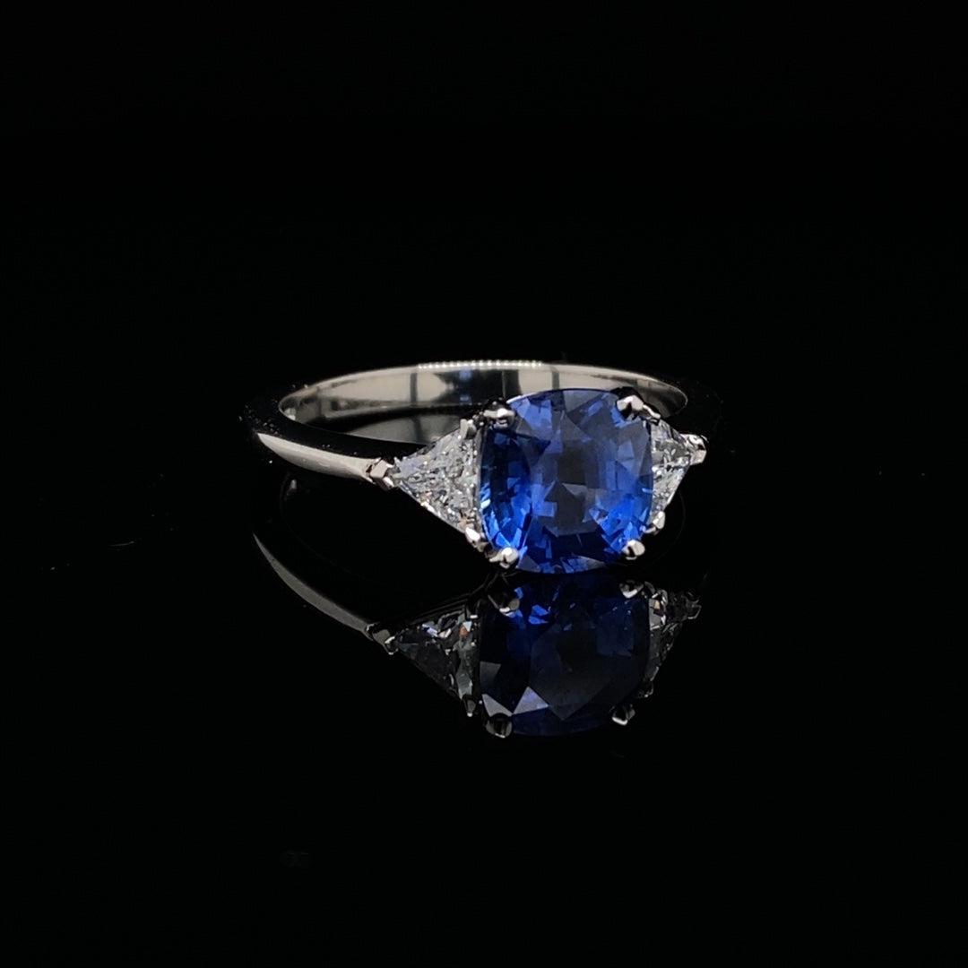 1.63ct Cushion Sapphire and Trilliant Diamond Three Stone Ring