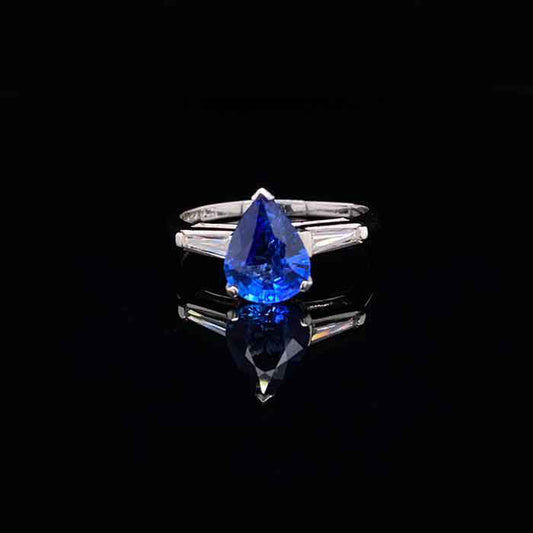 1.69ct Pear Cut Sapphire And Diamond Three Stone Ring