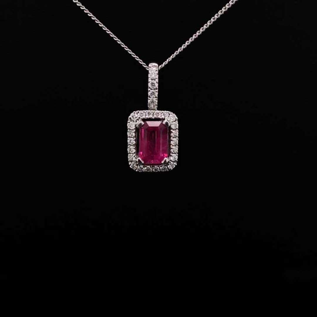 18ct White Gold 0.57ct Emerald Cut Ruby and Round Diamond Cluster Pendant