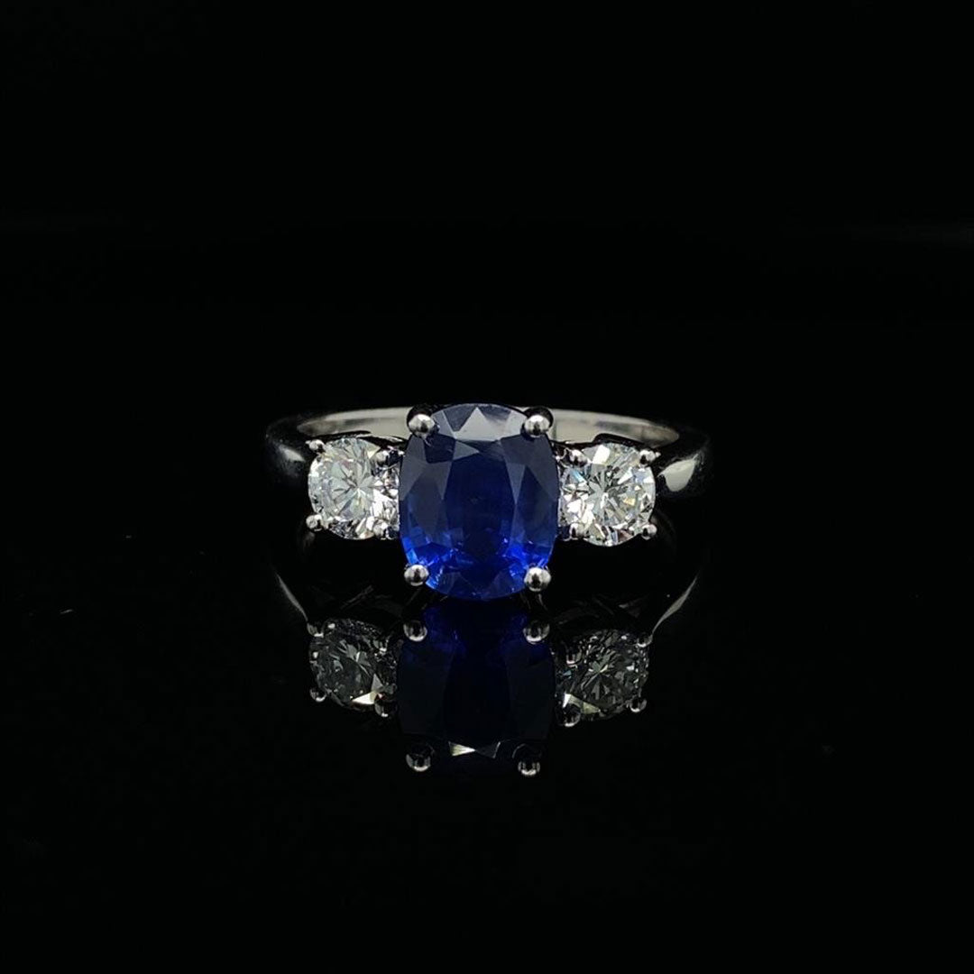 2.00ct Cushion Cut Sapphire and Round Diamond Three Stone Ring