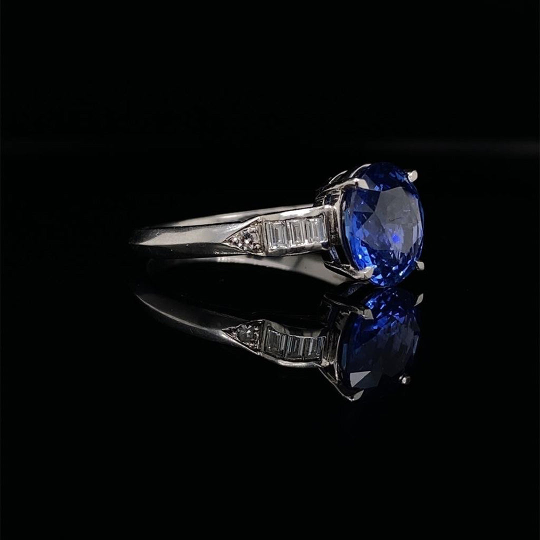 2.54ct Oval Cut Sapphire Solitaire Ring With Diamond Set Shoulders