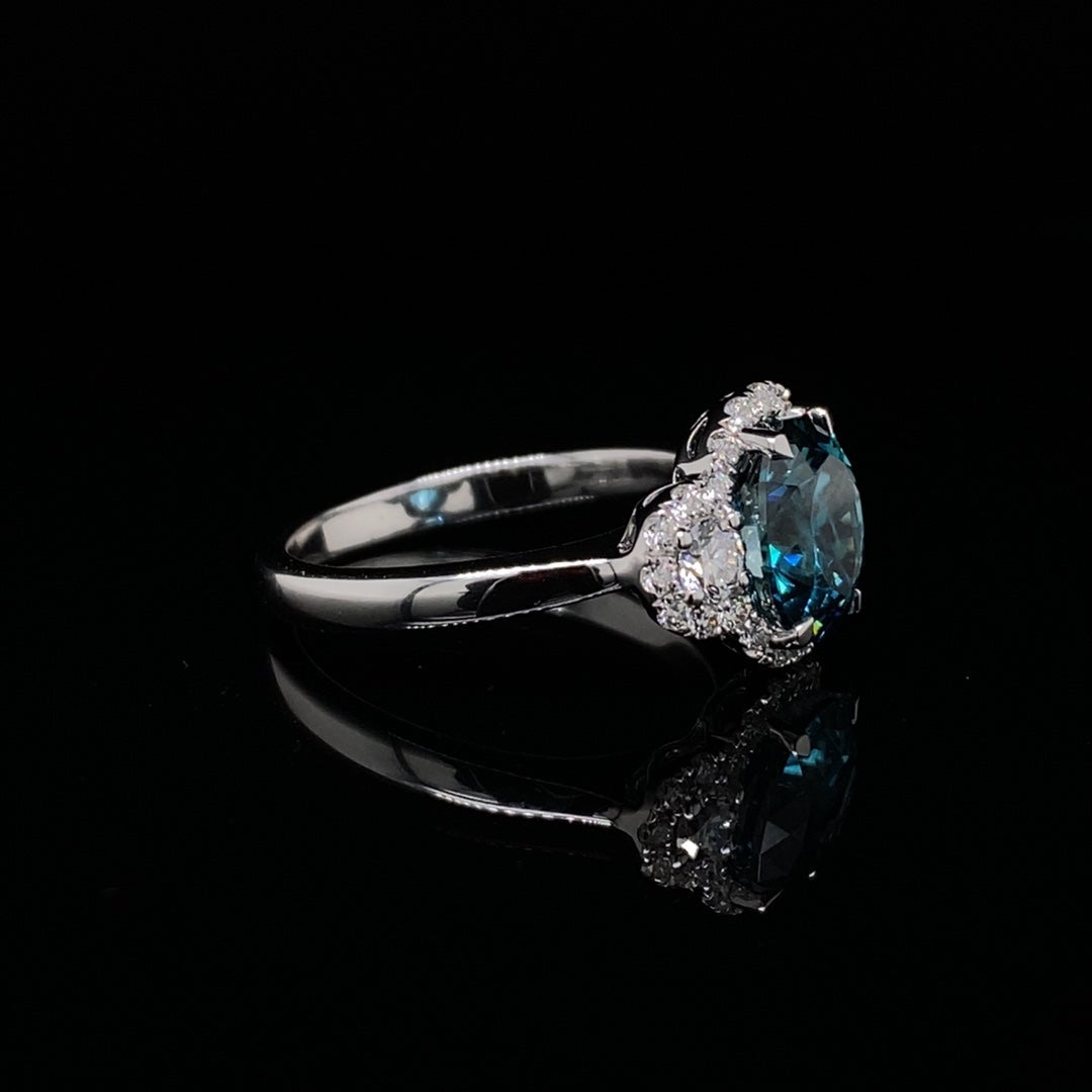 2.67ct Oval Cut Blue Zircon and Diamond Three Stone Cluster Ring