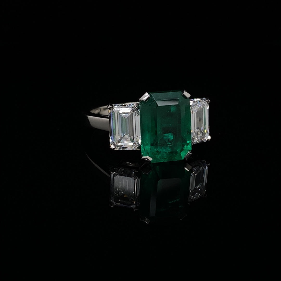 3.30ct Emerald Cut Emerald and Diamond Three Stone Ring