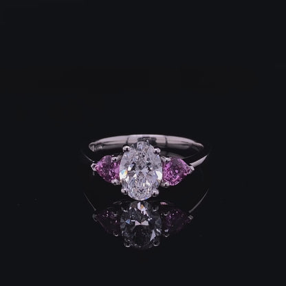 1.06ct Oval Diamond And Heart Cut Pink Sapphire Three Stone Ring