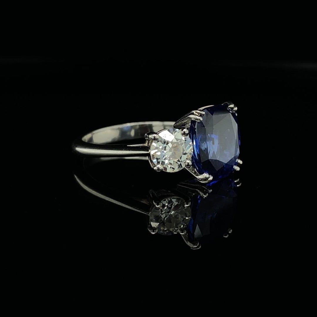 4.12ct Cushion Cut Sapphire and Round Diamond Three Stone Ring