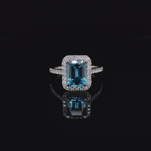3.42ct Emerald Cut Blue Zircon and Diamond Cluster Ring