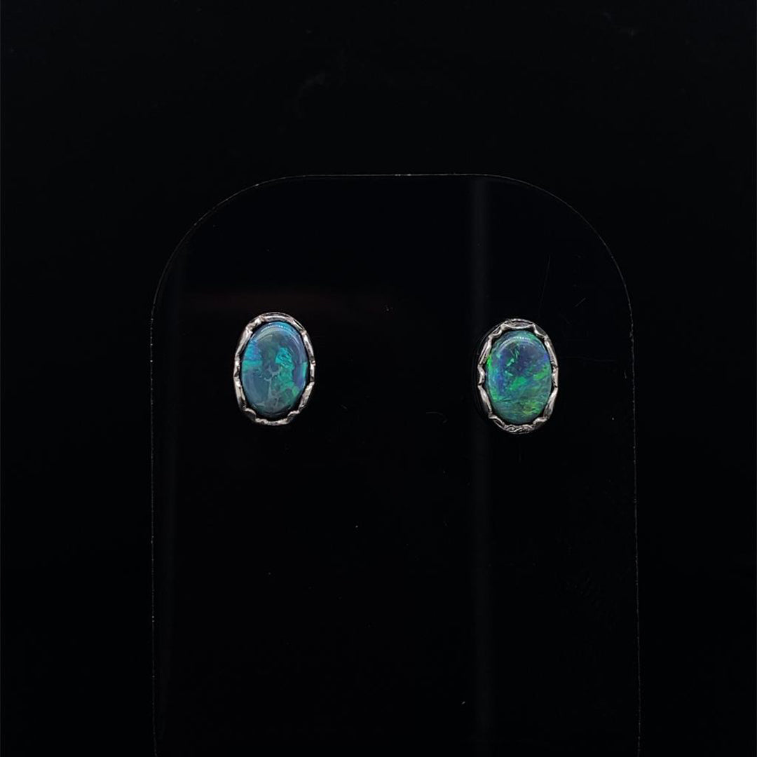 Oval Cut Opal Solitaire Earrings