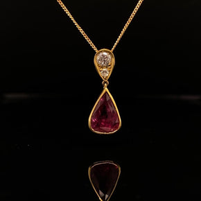 Pear Cut Ruby and Round Diamond Pendant