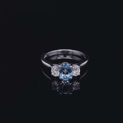 0.70ct Oval Aquamarine And Oval Diamond Three Stone Ring